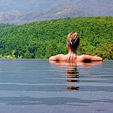 Woman in Infinity or negative edge pool